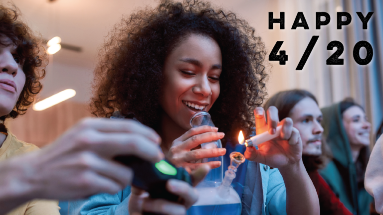 Joyous Partygoer Lighting up a Bong on 4/20